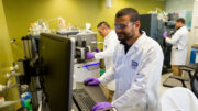 A four-year deal between Anthropic and the Gates Foundation will combine $200 milion with access to Claude credits and technical support. Image: “Working in the DMPK Lab” by National Center for Advancing Translational Sciences, Public Domain Mark